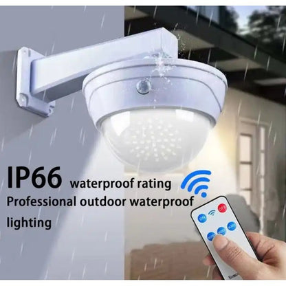 Lampă solară LED cu telecomandă – gen cameră falsă, senzor mișcare, 3 moduri lumină, IP66, albă